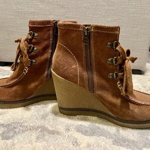 Brown suede platform ankle boots.